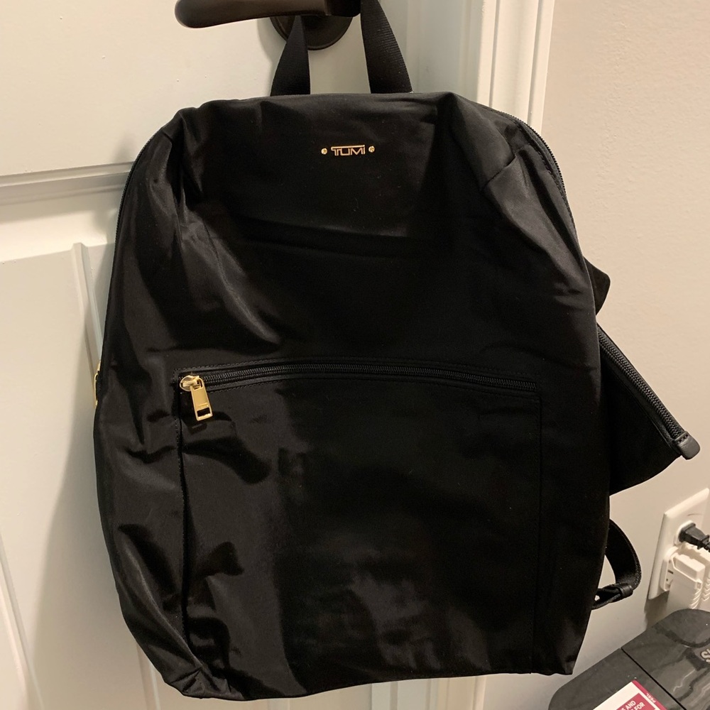 Tumi back back and small pouch